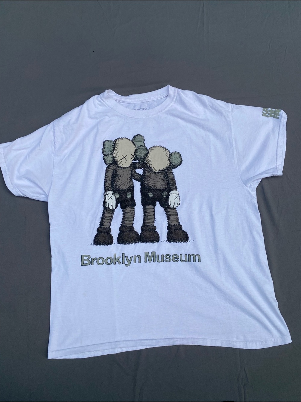 KAWS White T-Shirt with Brown/Gray KAWS Companion Graphic – Brooklyn Museum